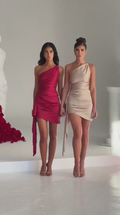 Model wearing a one-shoulder sleeveless mini dress by Ice & Rose – sexy slim and backless design perfect for weddings and parties.